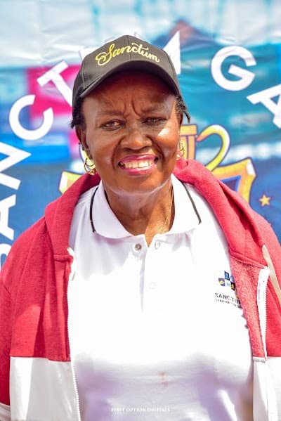 Sanctum staff member at a school welfare event wearing branded Sanctum apparel